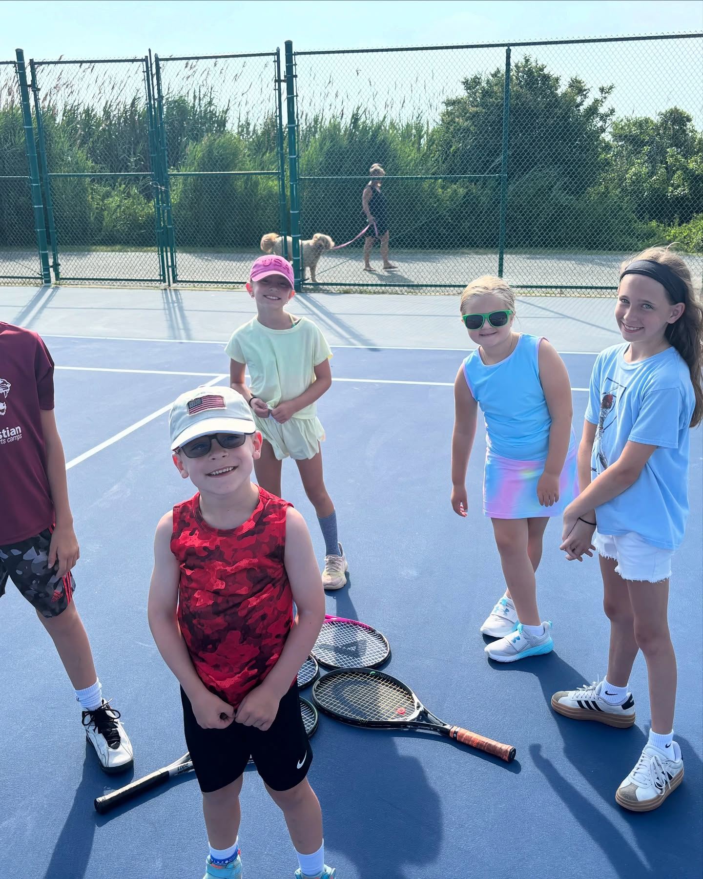 Kids having fun at a Universal Rackets summer camp